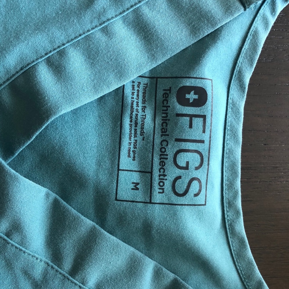 COPY - Gently used Leon two-pocket top only